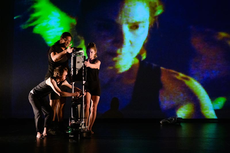Three dancers perform with an ChatGPT-enabled robot  robot 